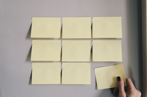 Several post-it notes on a wall