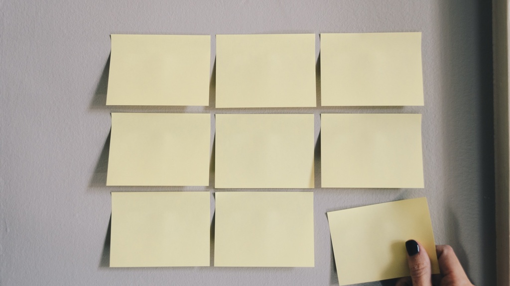 Several post-it notes on a wall